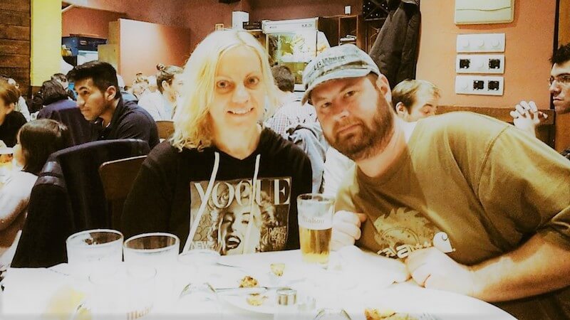 Two people drinking beer