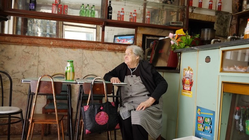 Older woman from Lisbon sitting in tavern
