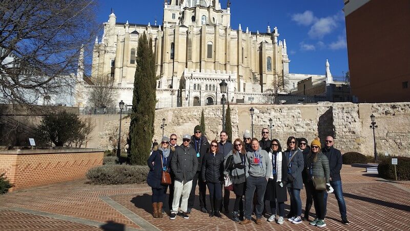 travel guide with group of tourists