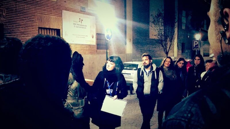 travel guide with group of tourists