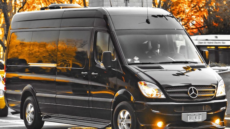Black van driving through Madrid streets